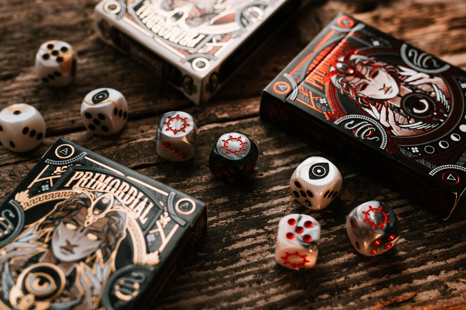 Dices and playing cards on a worn out wood