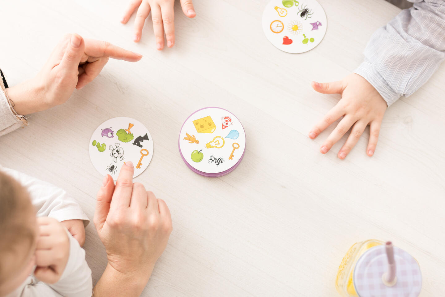 Family playing a memory card game