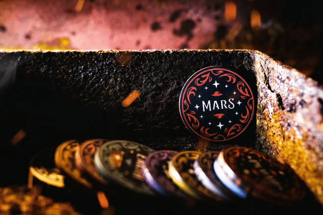 Gif of a pocker chip seen through fire and smoke